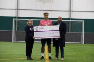 UK Meds present cheque to Nottingham Forest footballer